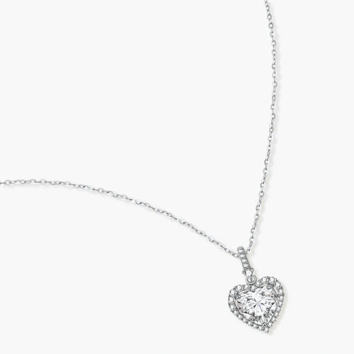 Sterling silver heart pendant necklace with brilliant moissanite center stone and halo setting on delicate chain