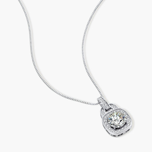 Sterling silver cushion halo pendant necklace featuring 2ct moissanite center stone with delicate box chain on neutral background.